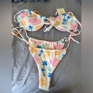 aurelle, size large, multi colored string bottoms and underwire top
